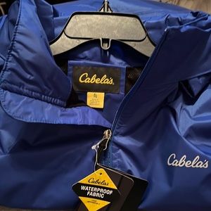 Cabela’s brand nautical blue rain jacket
